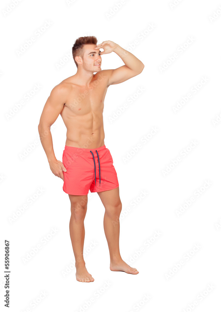 Handsome lifeguard with red swimsuit