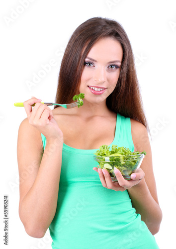 Beautiful girl with fresh salad isolated on white