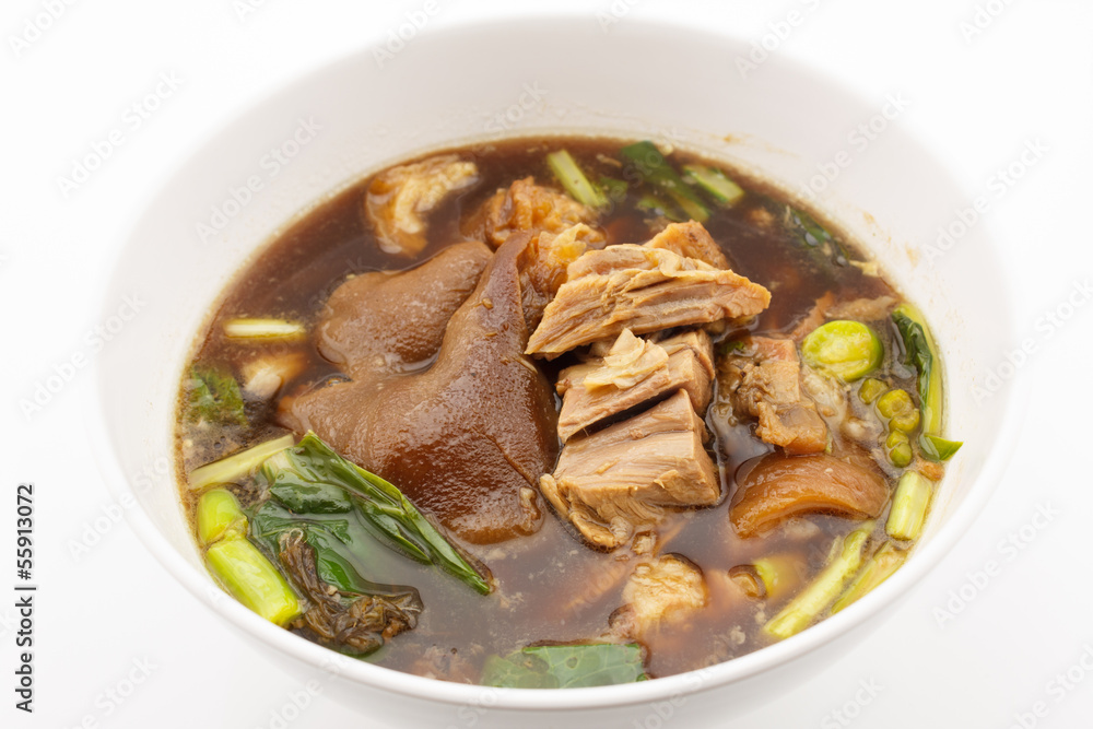 pork leg stewed in the gravy isolated on white background pork leg stewed in the gravy isolated on white background