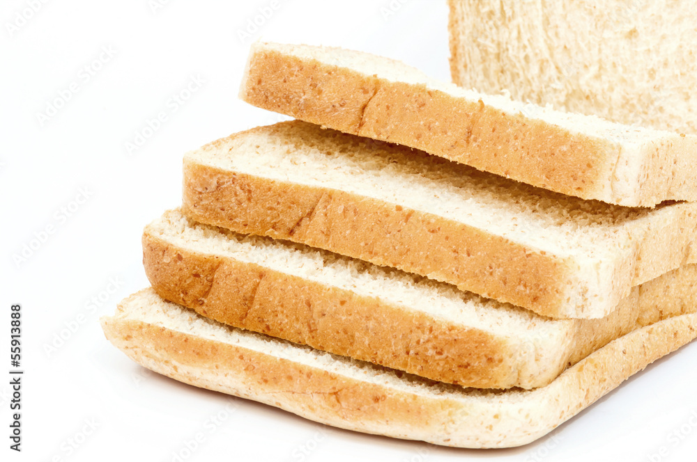 Sliced white bread on white background . Sliced white bread on white background .