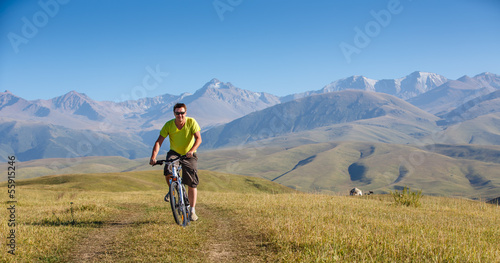 male riding a mountain bike