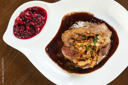 Delicious duck breast dish with gravy and rice
