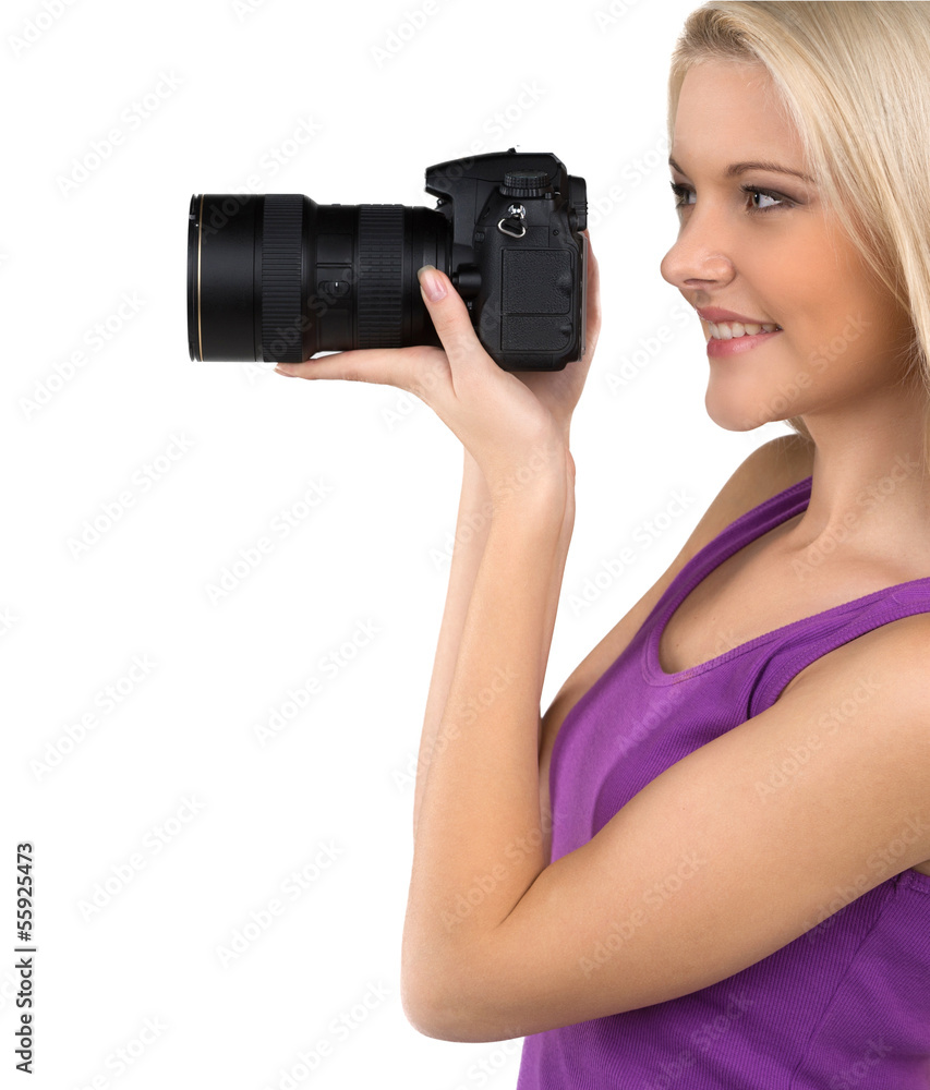 Women with camera. Side view of cheerful young women holding cam Women with camera. Side view of cheerful young women holding cam