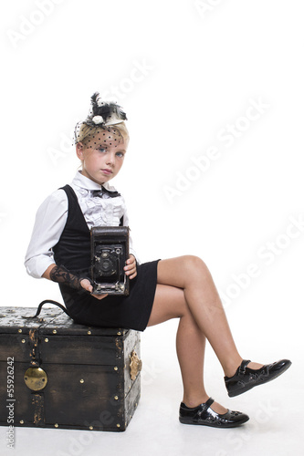 Retro girl with camera