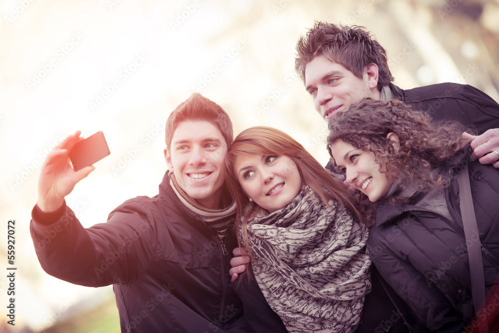 Group of teenagers posing for a photograph Group of teenagers posing for a photograph