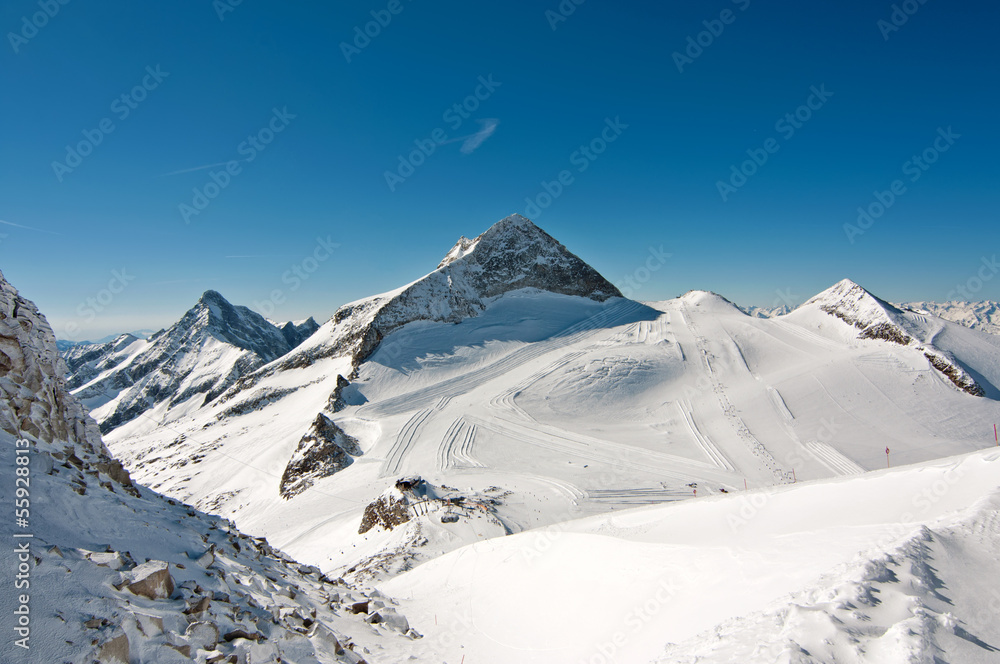 Winter scenic landscape with ski and snowboard slopes