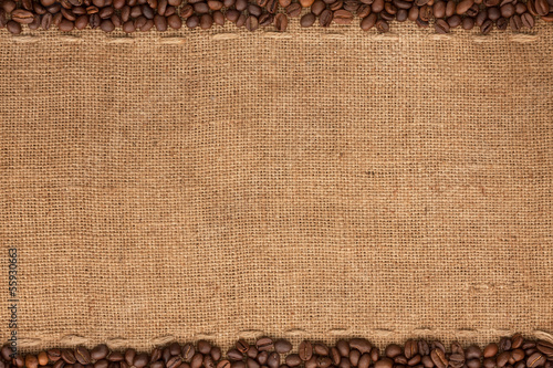 Coffee beans lying on sackcloth