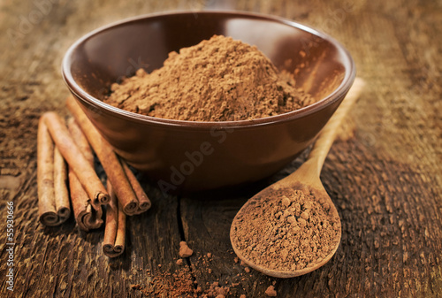 Cocoa powder and cinnamon sticks