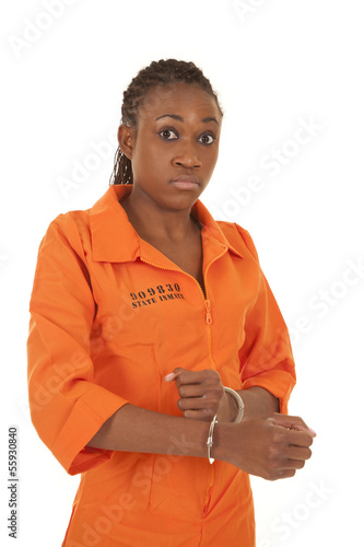 Canvas Print woman prisoner orange handcuff looking