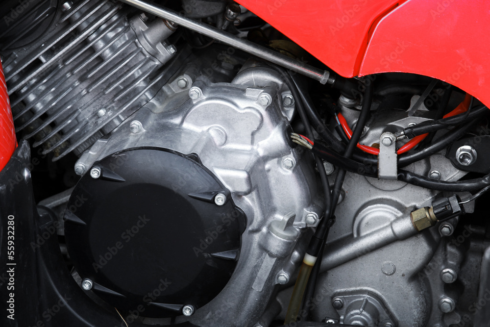 Obraz premium Sport motorcycle engine under red cover