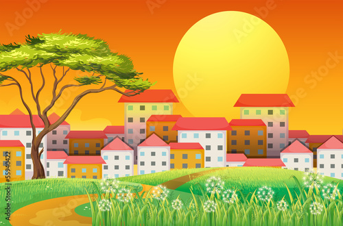 Tall buildings under the bright yellow moon