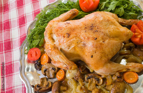  served baked chicken on tray photo