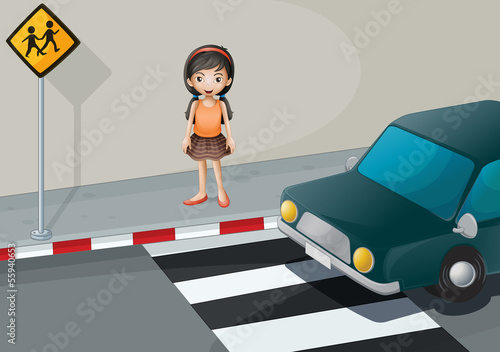 A girl near the pedestrian lane with a car
