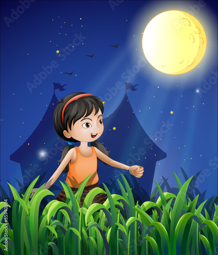 A happy young girl watching the moon