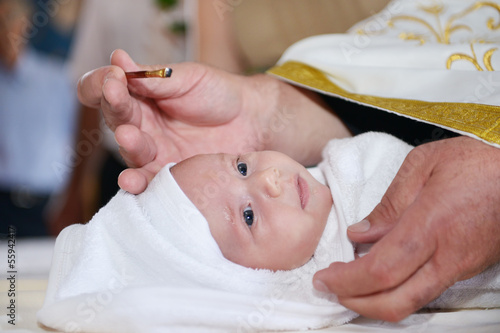Annoyed baptized baby photo