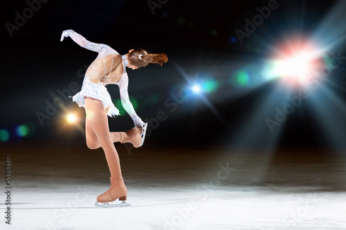 Bild auf Leinwand Little girl figure skating