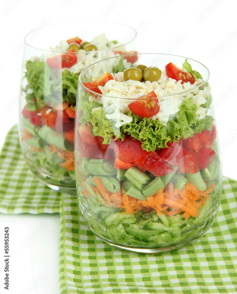 Tasty salad with fresh vegetables, isolated on white Tasty salad with fresh vegetables, isolated on white