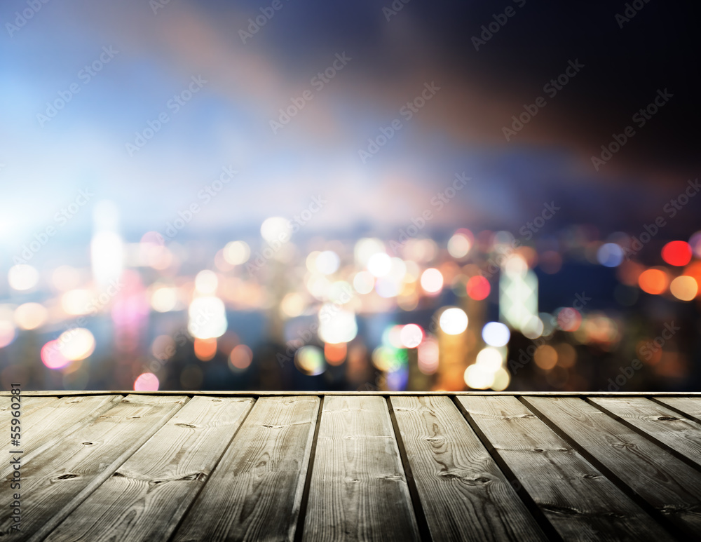 Fototapeta premium wooden platform and lights of night Hong Kong
