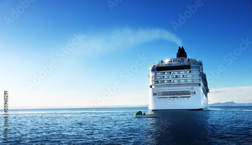 Caribbean sea and cruise ship in sunset time