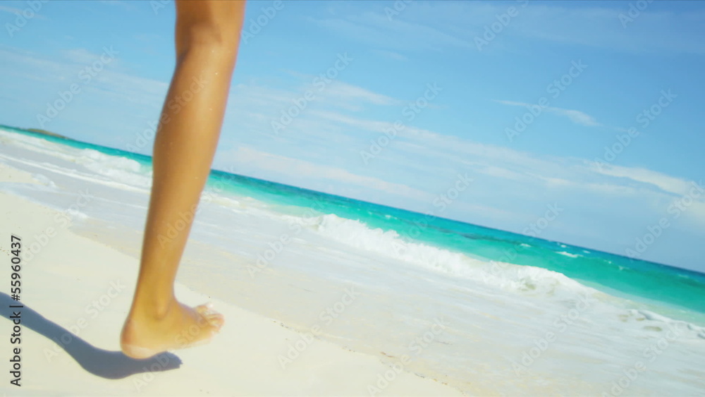Hispanic Girl Running Tropical Beach Into Sea