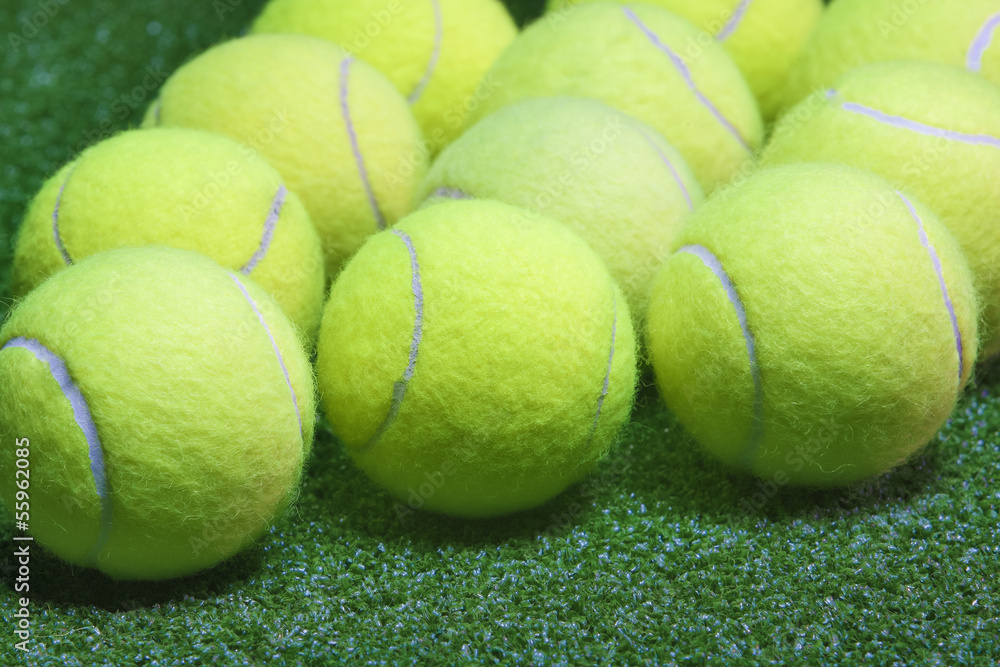Tennis balls on artificial grass