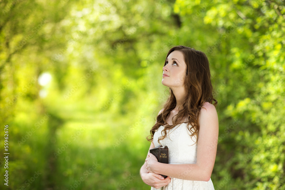 Beautiful woman with Bible Beautiful woman with Bible