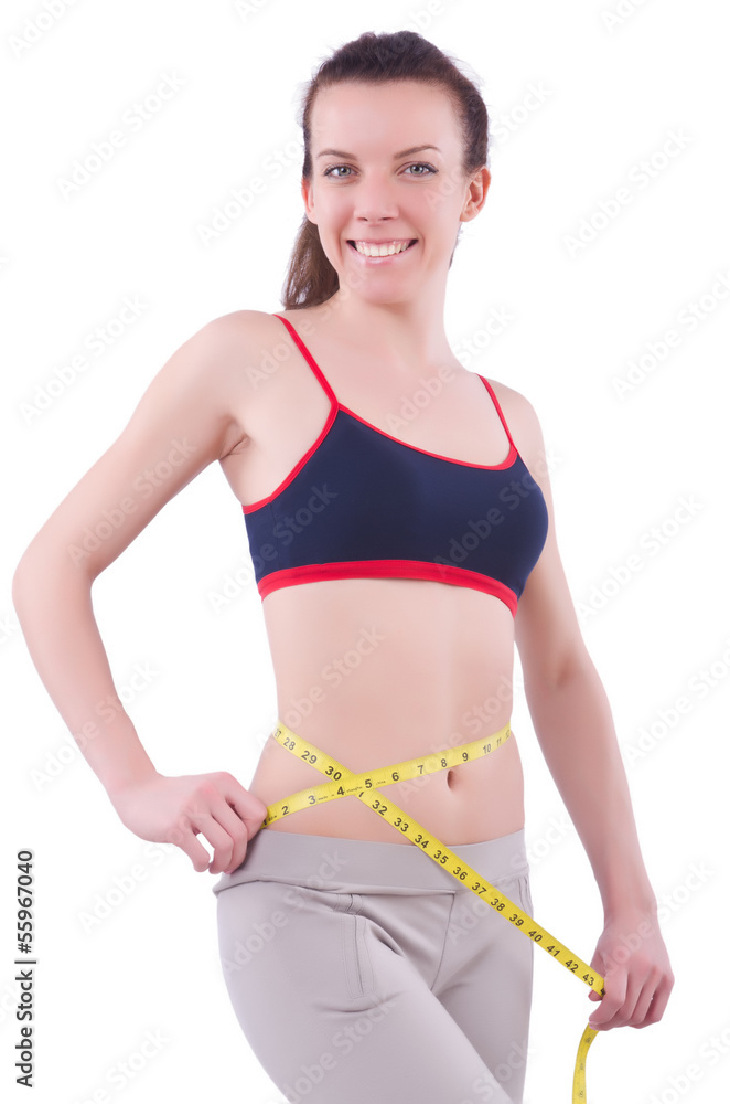 Young girl with centimeter in dieting concept Young girl with centimeter in dieting concept