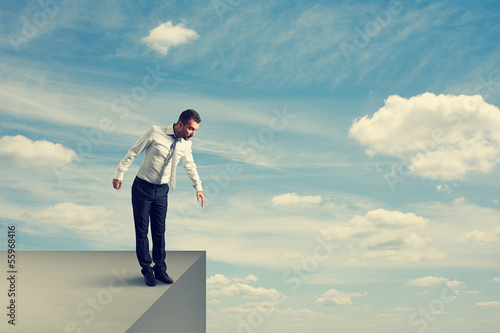 man standing over the precipice