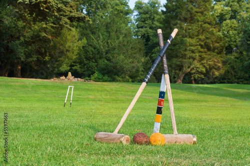 Croquet equipment propped up ready for use