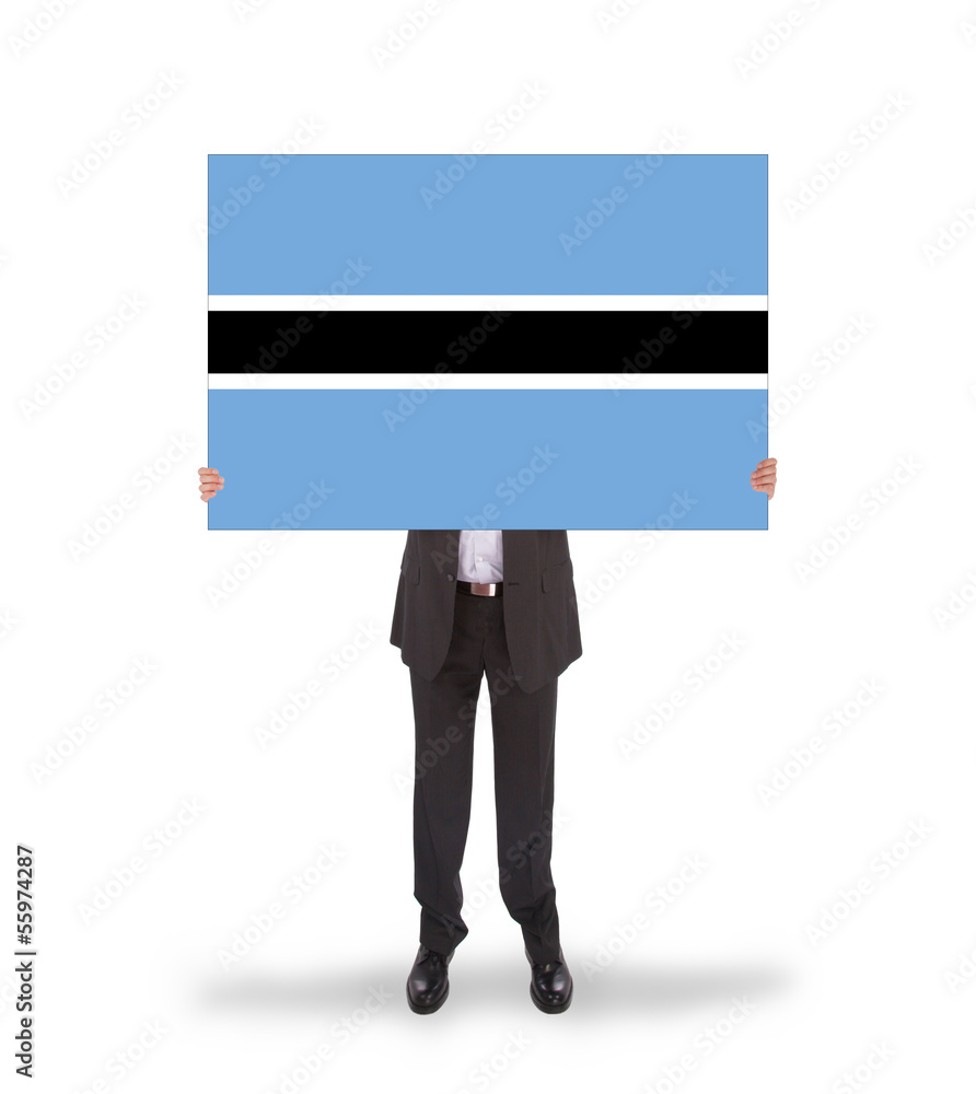 Businessman holding a big card, flag of Botswana Businessman holding a big card, flag of Botswana