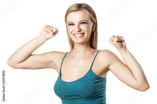 happy smiling girl with her hands up and clenched fists