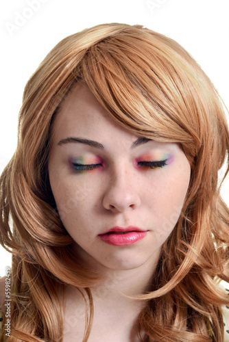 teen girl with rainbow eye shadow