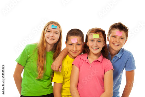 Boys and girls with stickers on forehead