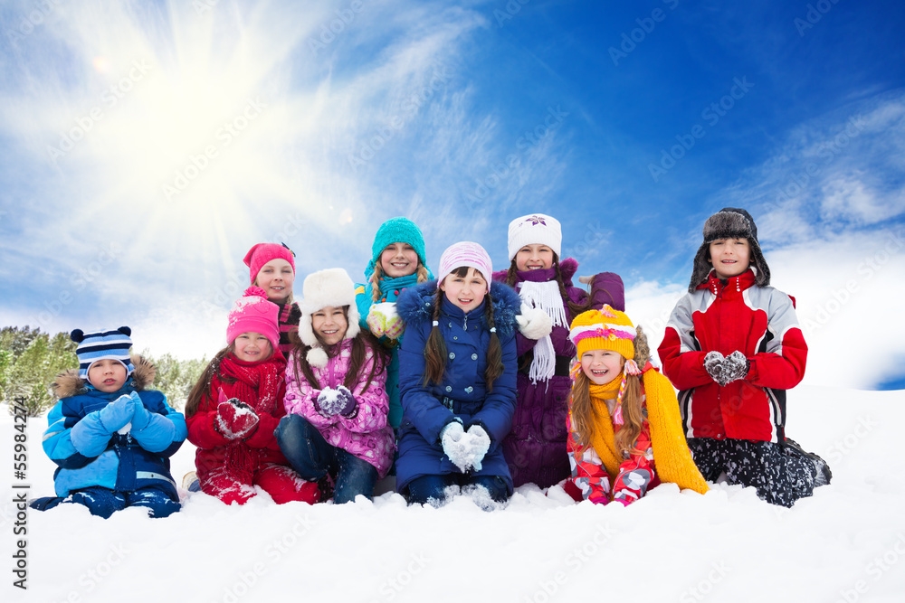 Large group of happy kids throwing snow Large group of happy kids throwing snow