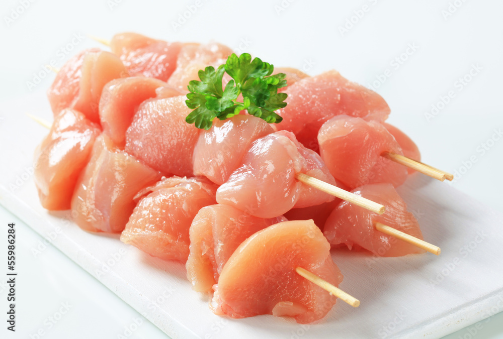 Raw chicken skewers