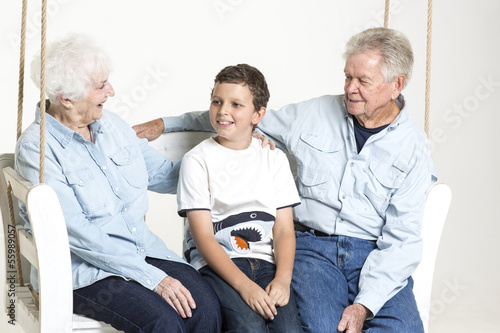 Young boy talks to his grandparents