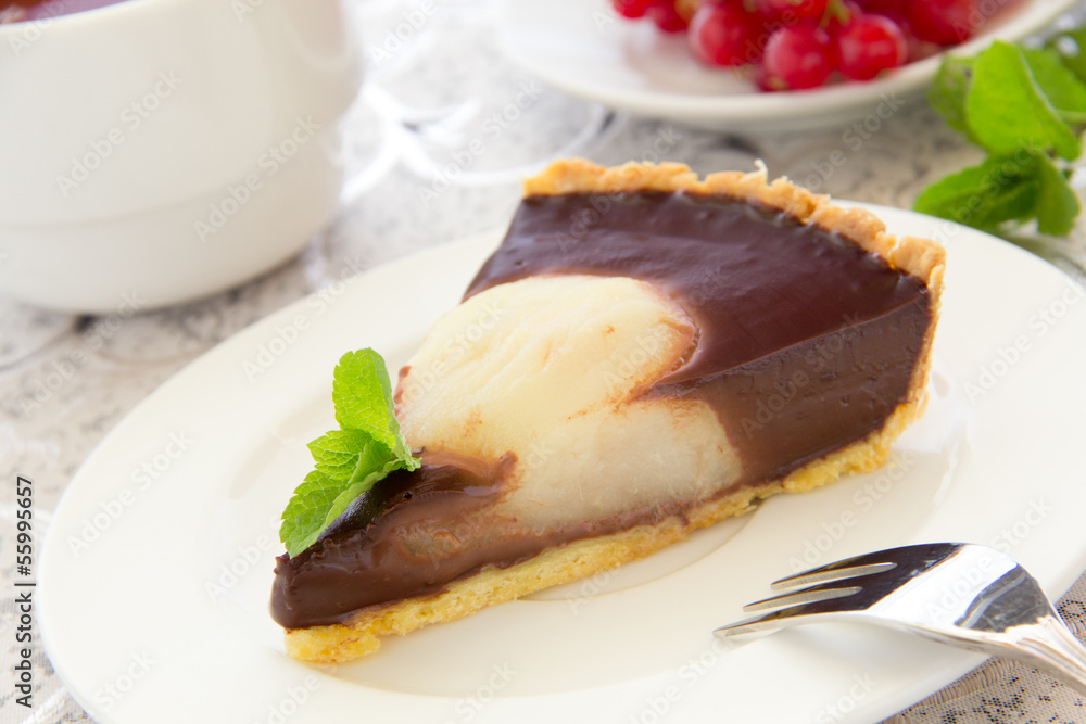 Chocolate tart with pears. Selective focus.
