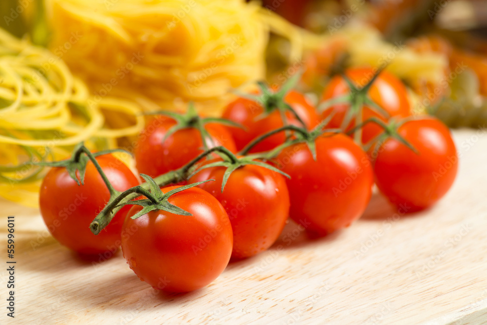 close-up of cherry tomatoes and pasta close-up of cherry tomatoes and pasta