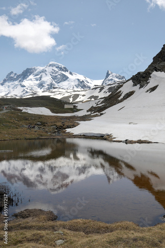 Reflections in waters of Schwarzsee beneath Matterhorn