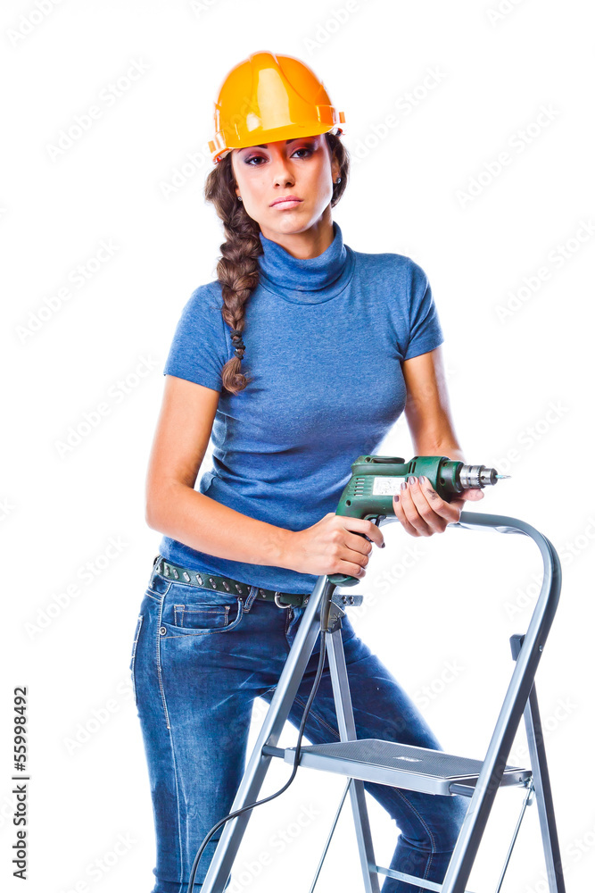 young beautiful woman in yellow construction helmet young beautiful woman in yellow construction helmet