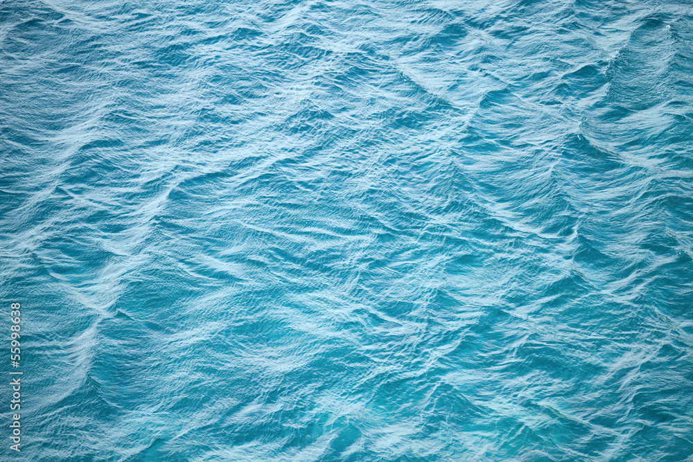 Fototapeta Błękitna wody morskiej fotografii tła tekstura z czochrą