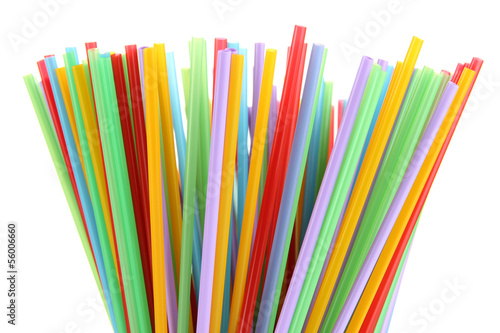 Many straws close-up isolated on white