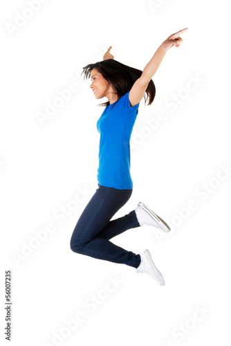 Young happy woman jumping in the air