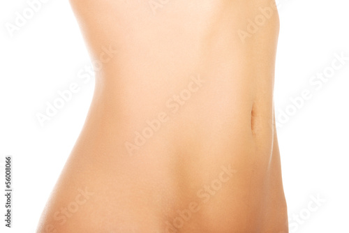 Close up of perfect nude body of young fit woman