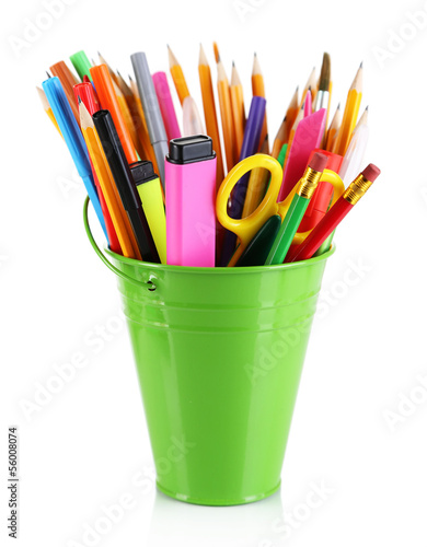 Colorful pencils and other art supplies in pail isolated