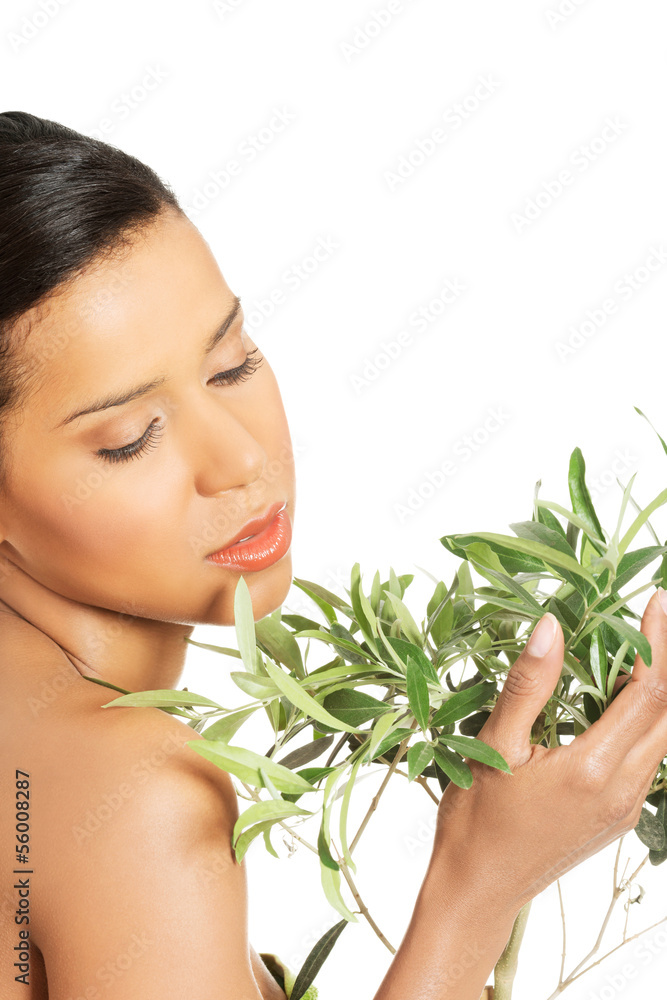 Woman with health skin and with olive tree Woman with health skin and with olive tree