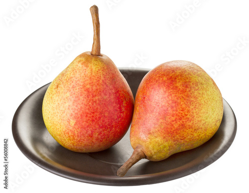 Two ripe pears on a black plate on a white background
