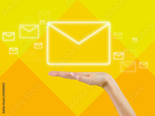 email symbol in the palm of hand,background photo