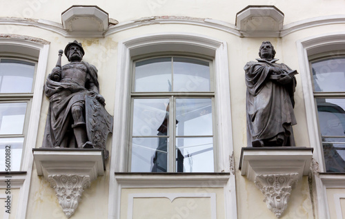 Bronze Statues on the Facade of a Historic Palace