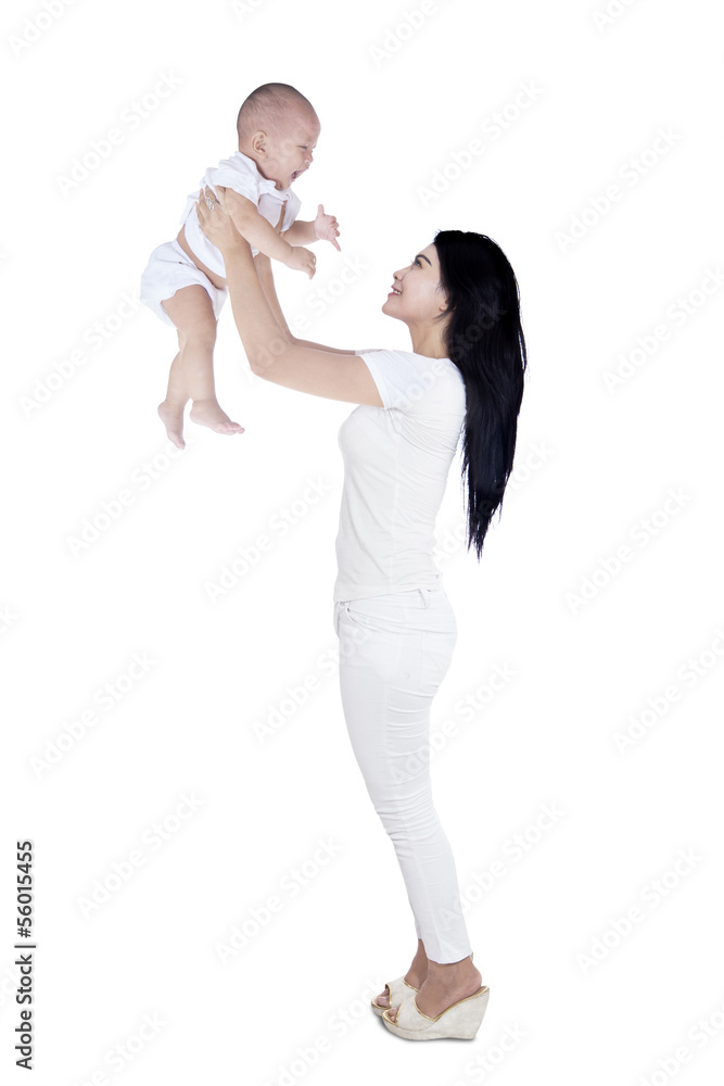 Portrait of joyful mother and her baby having fun - isolated